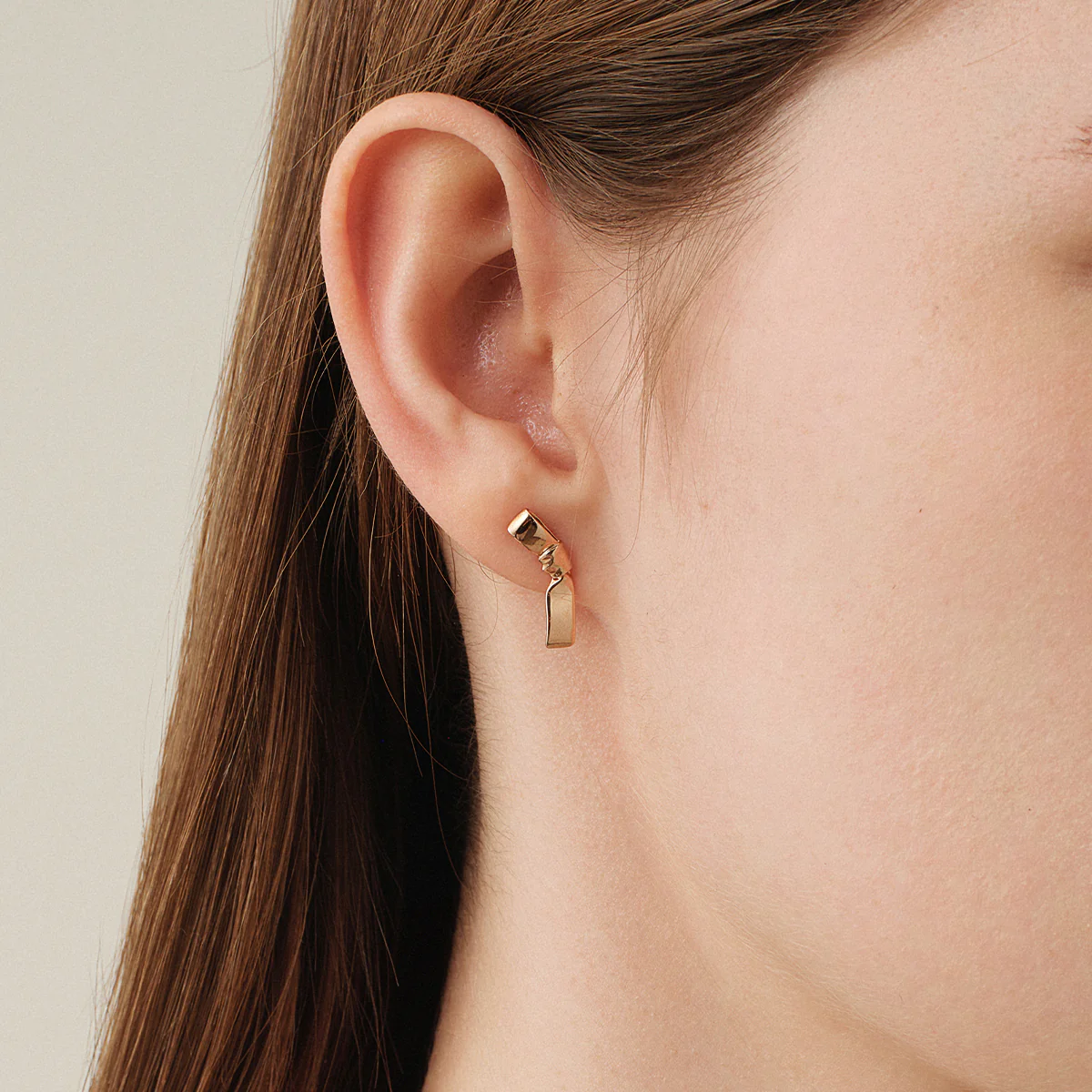 10K Rose Gold Ribbon Design Stud Earrings - Image 2